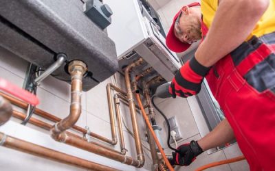 Do I Need a Plumber or Electrician for Hot Water Repairs?